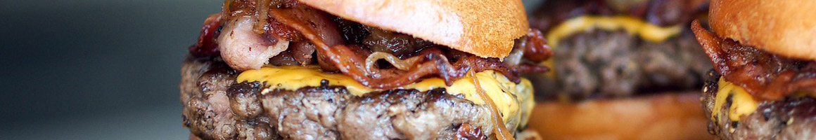 Eating American (Traditional) Burger Pub Food at Cedar Creek Bar & Grill restaurant in Houston, TX.